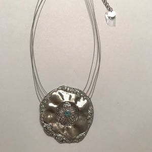 Touchstone Crystal- Sand Dollar Pendant